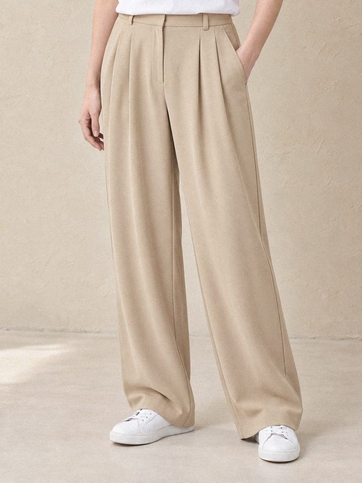 AI model wearing the beige wide pants, Lower body shot